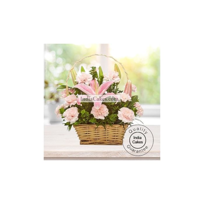 ARRANGEMENT OF LILLIUM AND CARNATION IN A BASKET