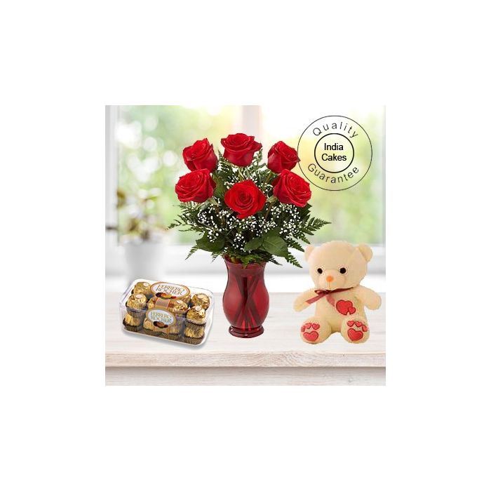 6 RED ROSES BUNCH , 16 PCS FERRERO ROCHER CHOCOLATES AND 1 TEDDY BEAR